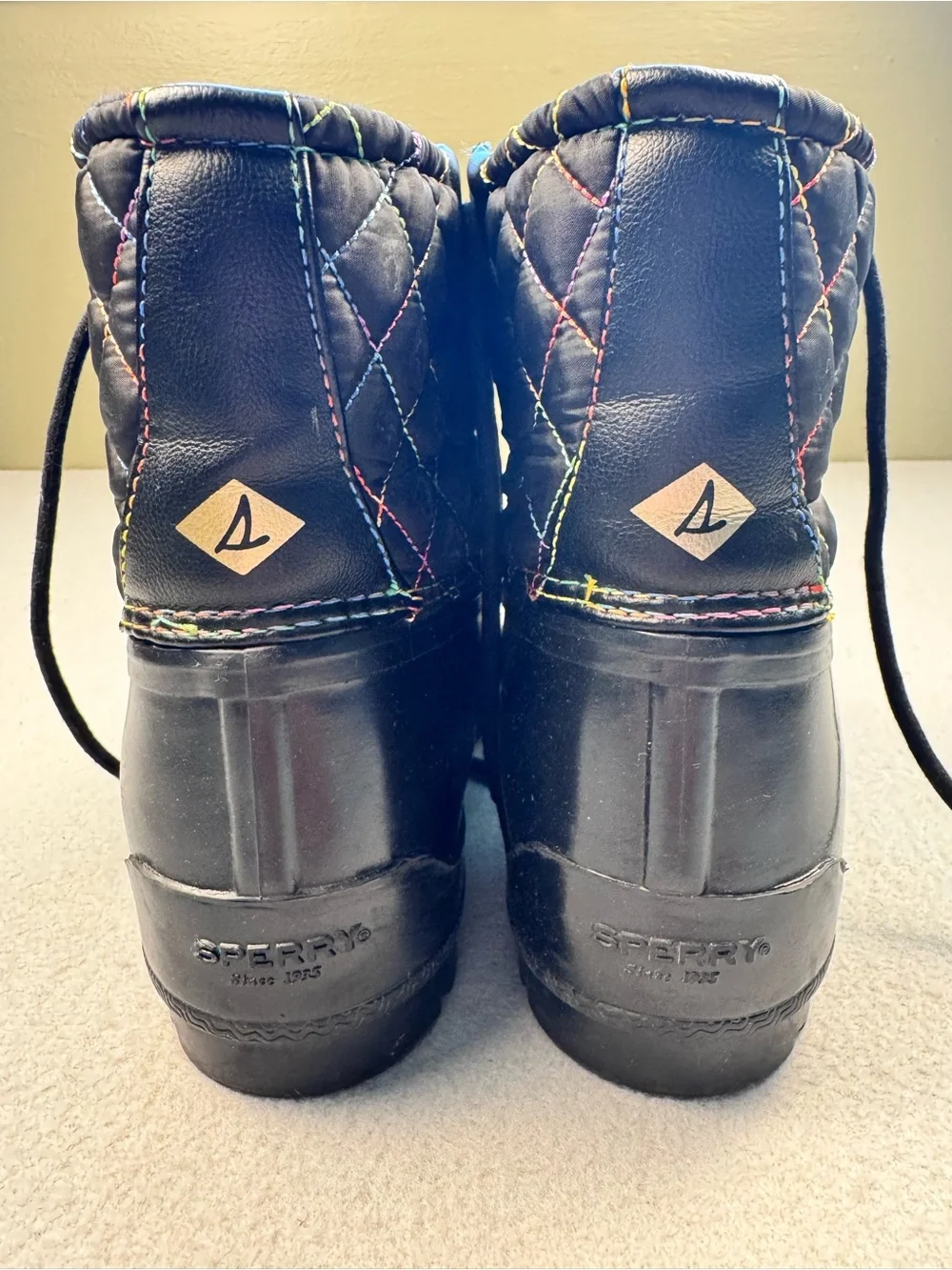 Sperry Black Quilted Lace-Up Rain Boots with Rainbow Stitching
